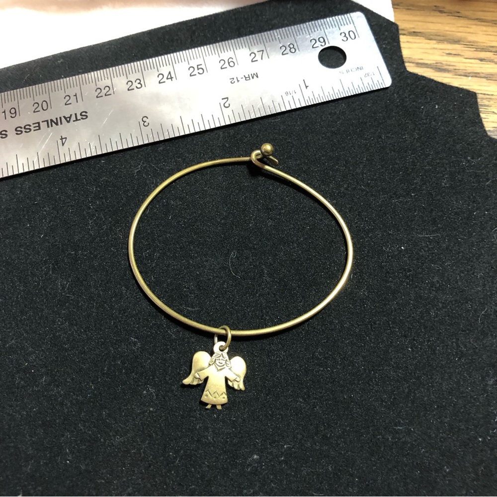 Retired Jeep Collins brass smiling Angel charm and hook style bracelet